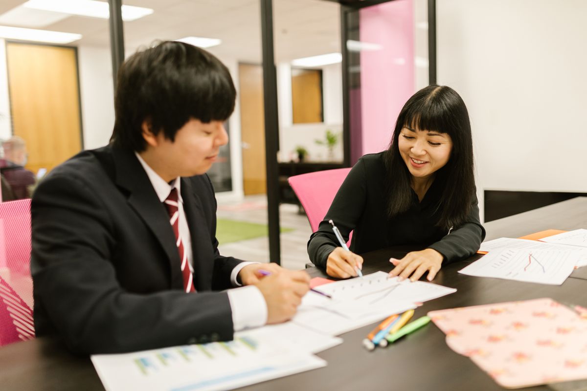 Professionals collaborating on a business review
